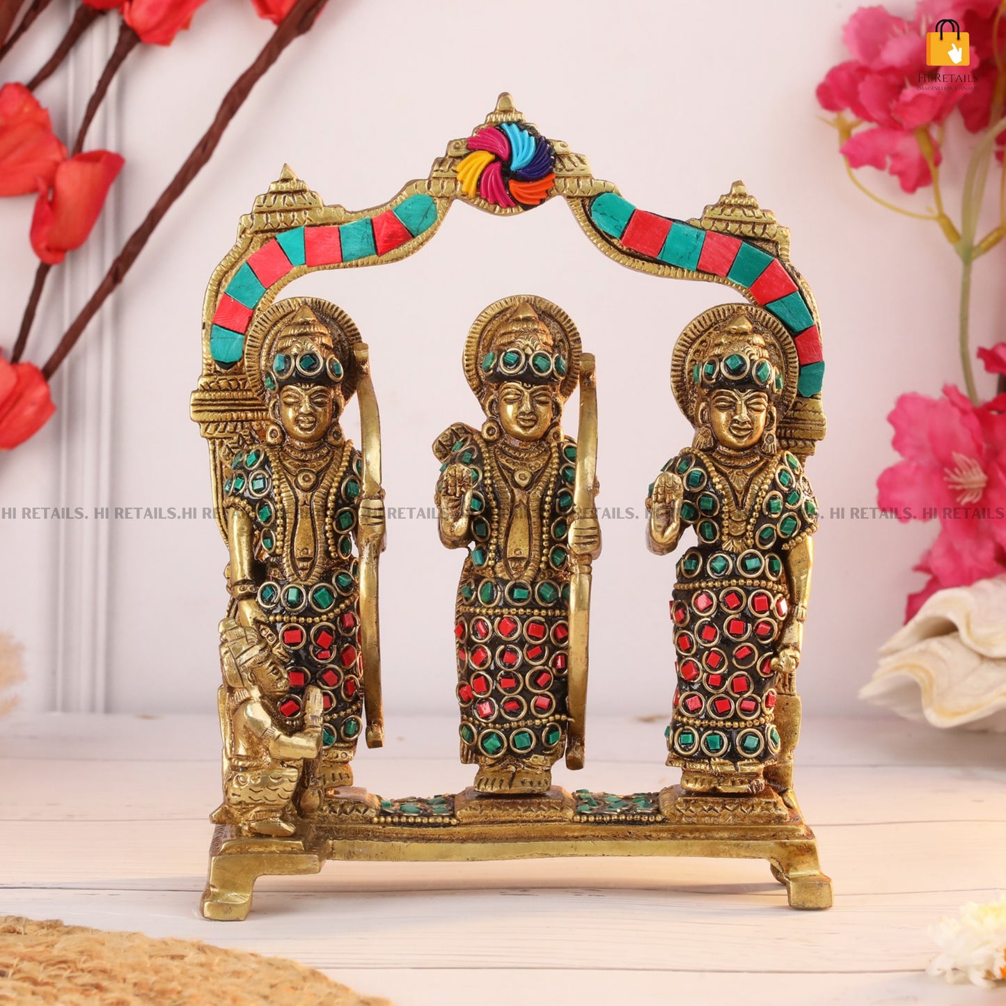 Handcrafted Brass Ram Darbar Idol with fine craftsmanship and colorful accents, a beautiful addition to your pooja room. Available at www.hiretails.com.