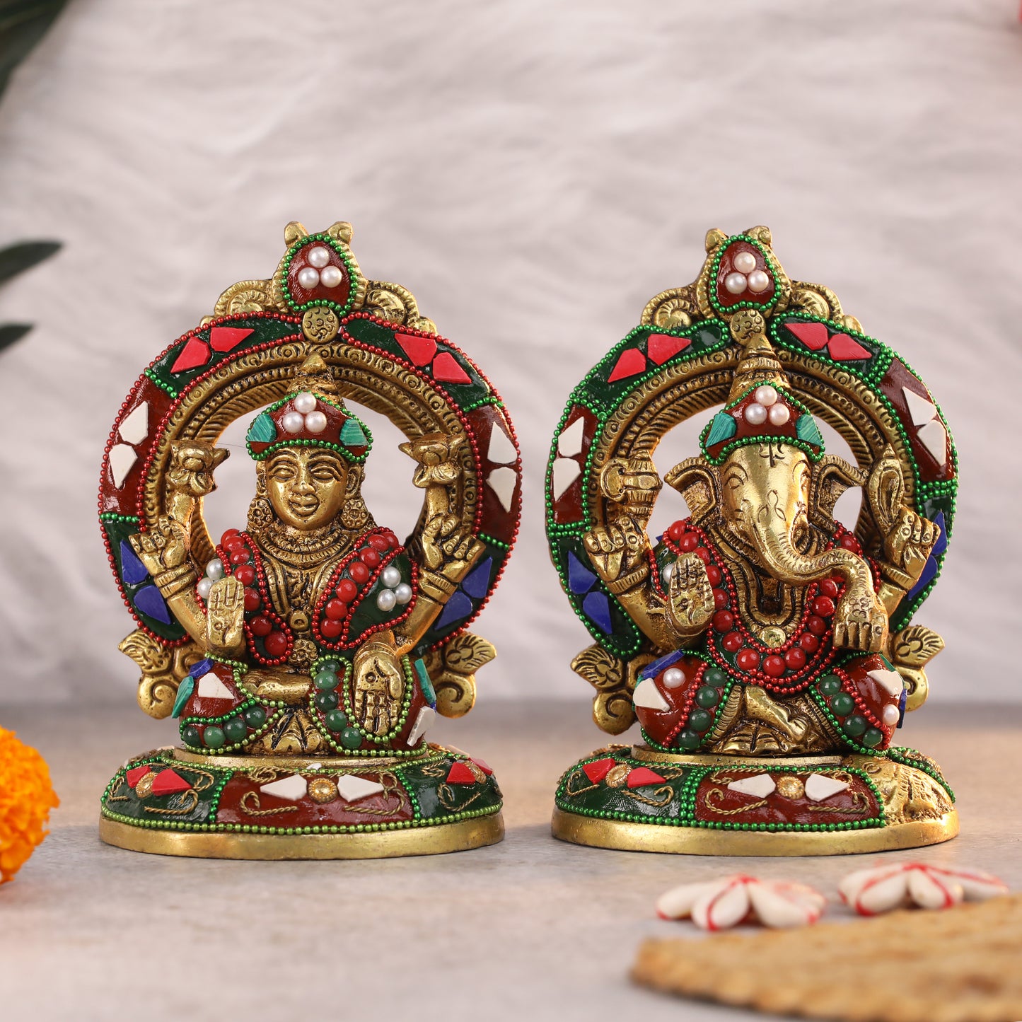 Brass Laxmi Ganesh idols with stone work, perfect for home temple decor or as a spiritual showpiece at www.hiretails.com