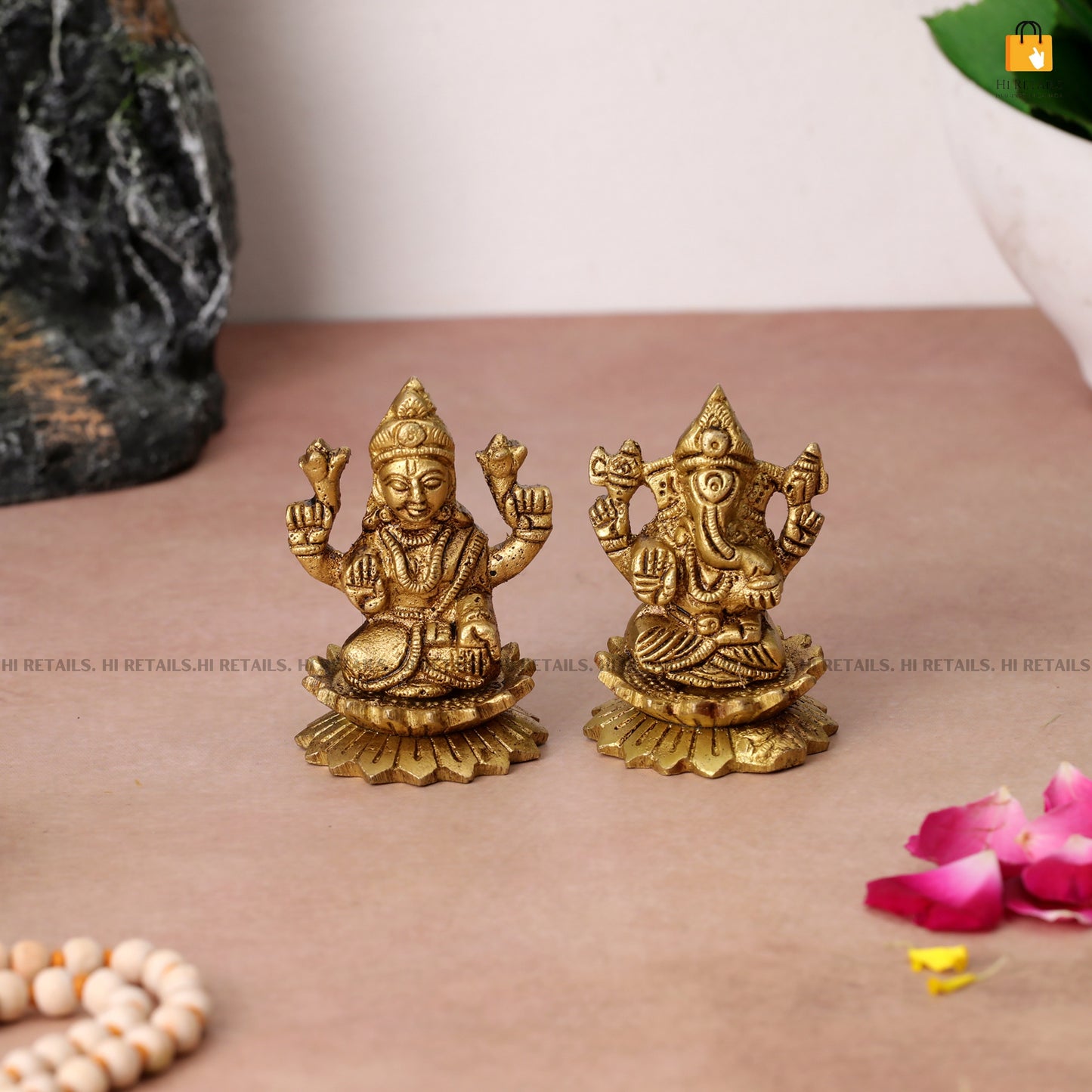Handcrafted brass Laxmi Ganesh idol on lotus, a divine addition for your home mandir or puja area at www.hiretails.com