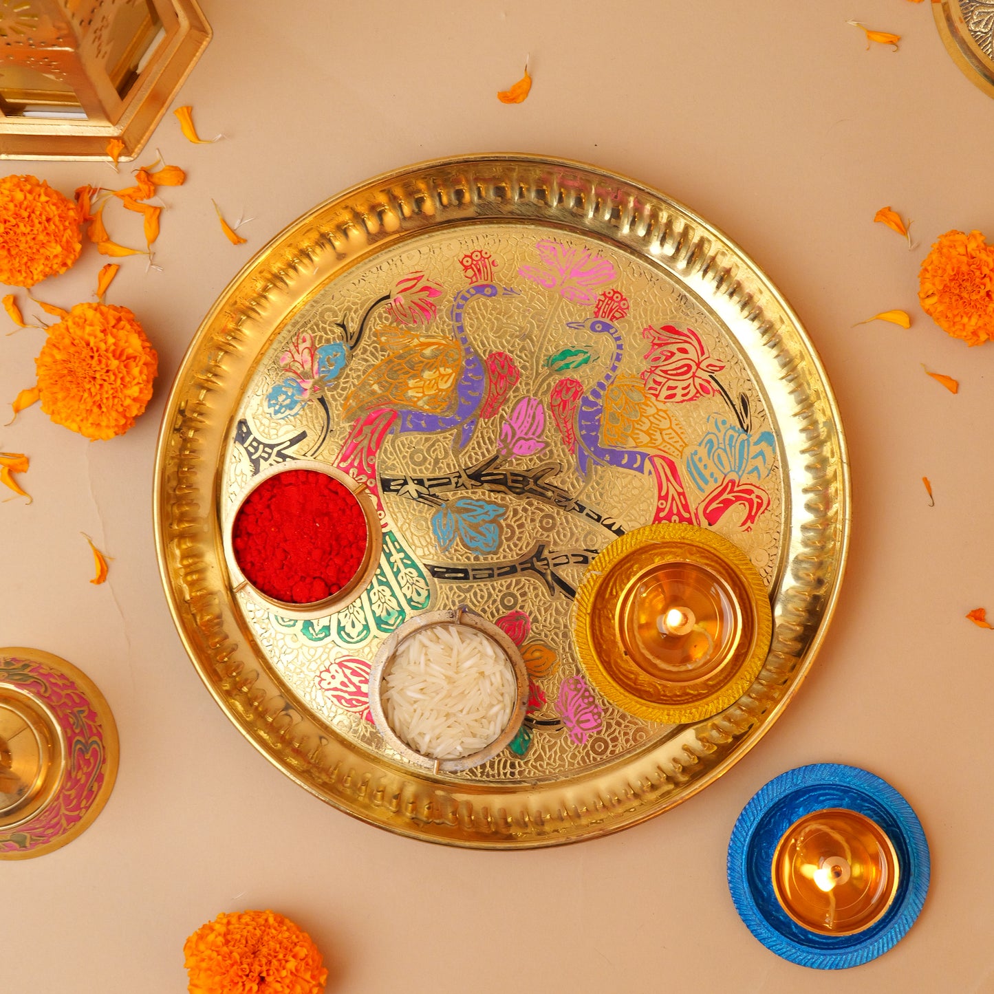 Brass Pooja Thali with intricate peacock design, ideal for spiritual rituals and home decor. Available at www.hiretails.com.