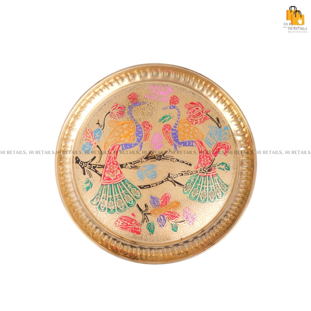 Decorative brass Pooja thali with traditional design, perfect for adding charm to your spiritual space. Available at www.hiretails.com.