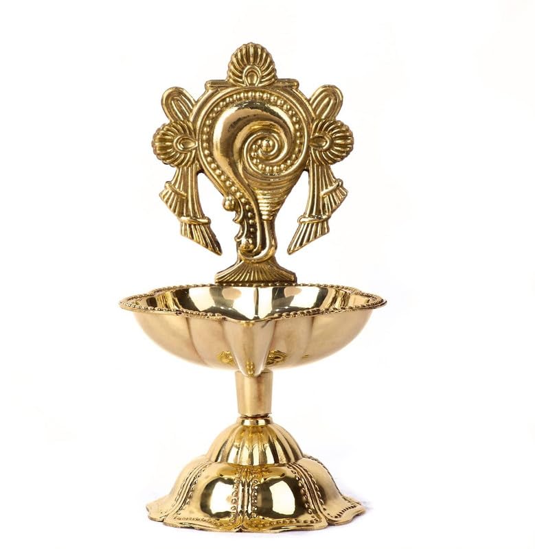 Elegant brass oil lamp with a detailed peacock design, ideal for enhancing home ambiance. Available at www.hiretails.com.