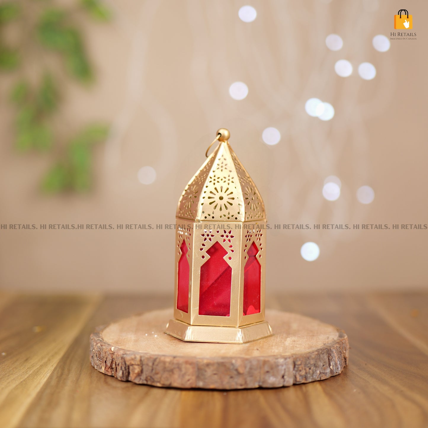 Brass round lamp with red glass panels, a perfect blend of classic style and modern elegance for your home. Available at www.hiretails.com.