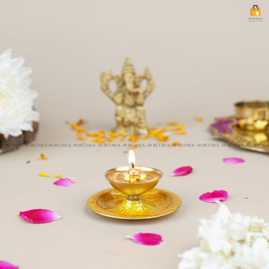 Brass Diya with Floral Petals for Pooja and Festive Decor | Premium Brass Oil Lamp for Spiritual Celebrations at www.hiretails.com
