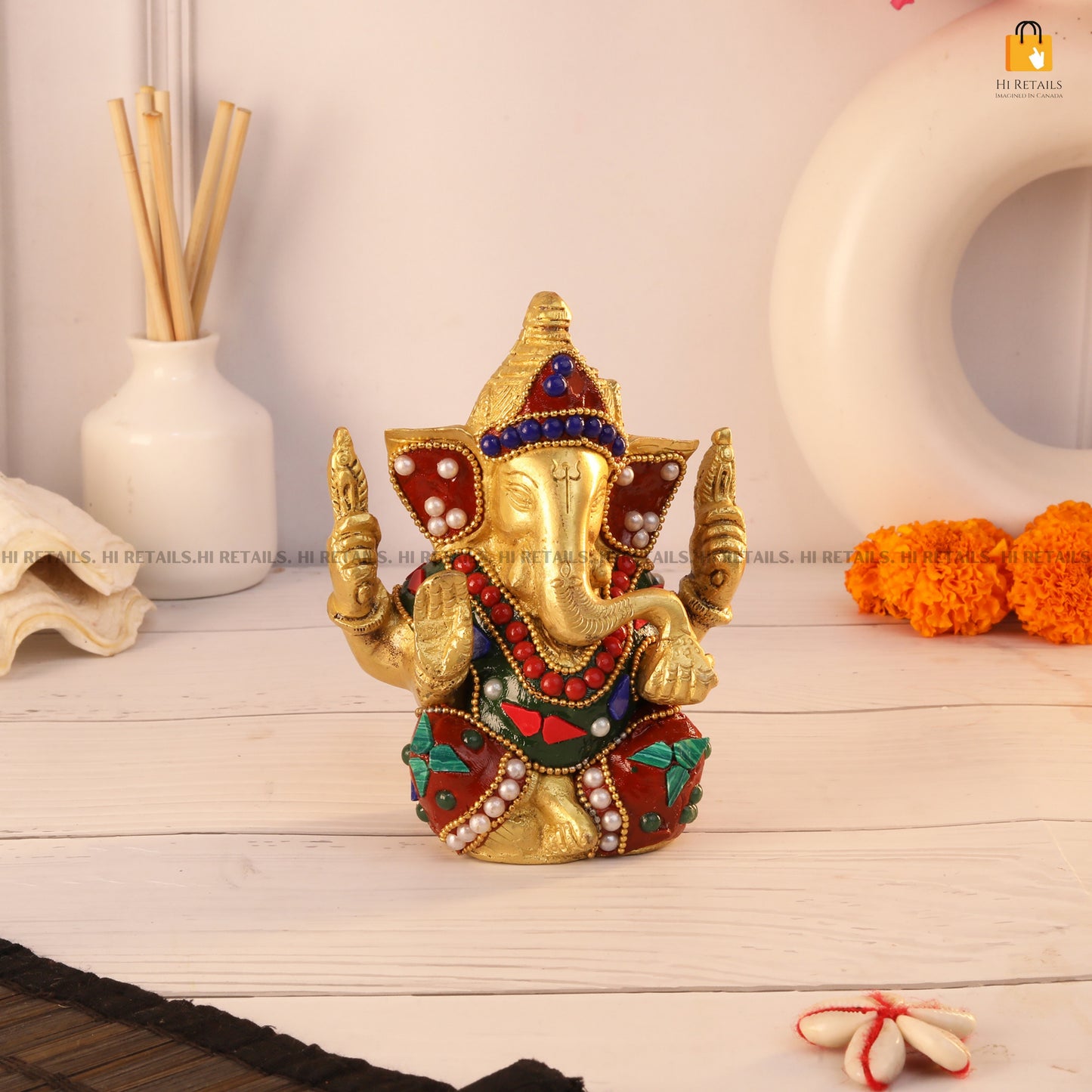 Traditional Brass Ganesh Idol with Vibrant Gemstone Accents for Pooja and Festivals | Decorative Lord Ganesha Statue at www.hiretails.com