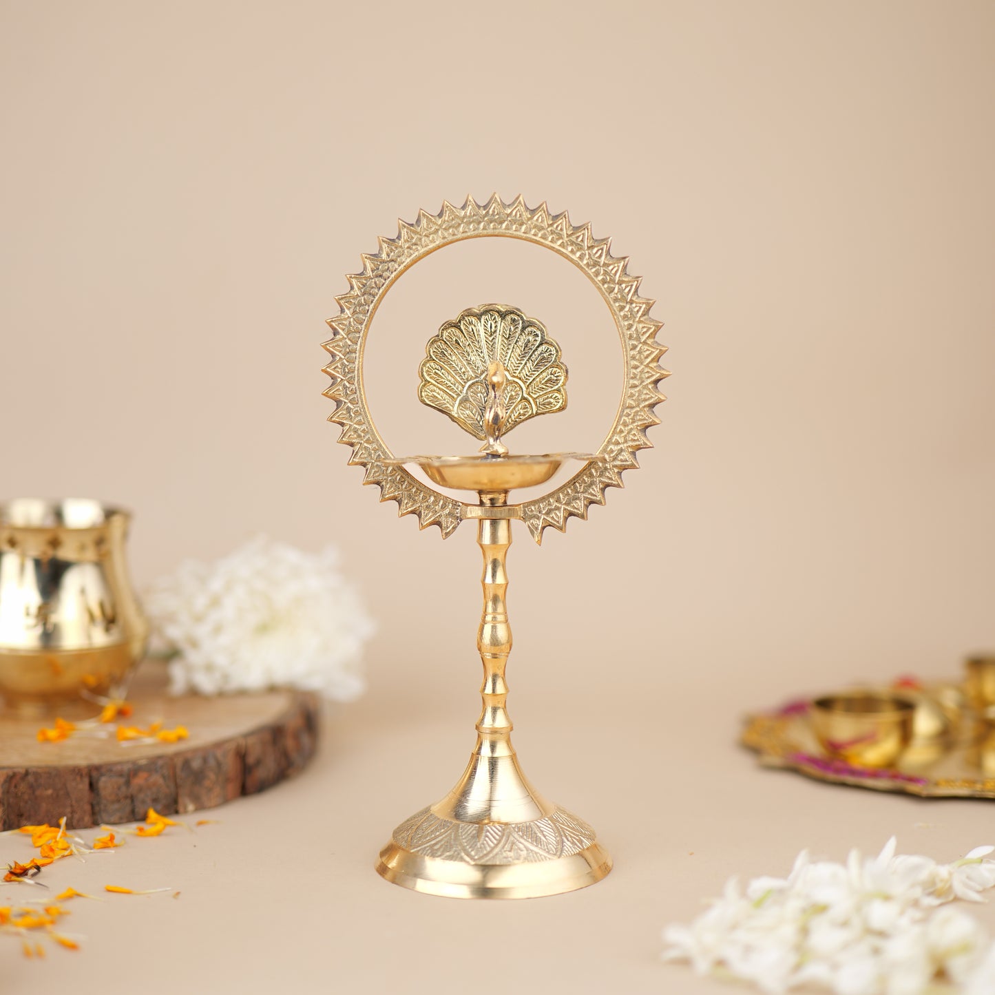 Brass Peacock Ring Oil Lamp for Spiritual Lighting | Elegant Brass Oil Lamp for Pooja and Home Decor at www.hiretails.com