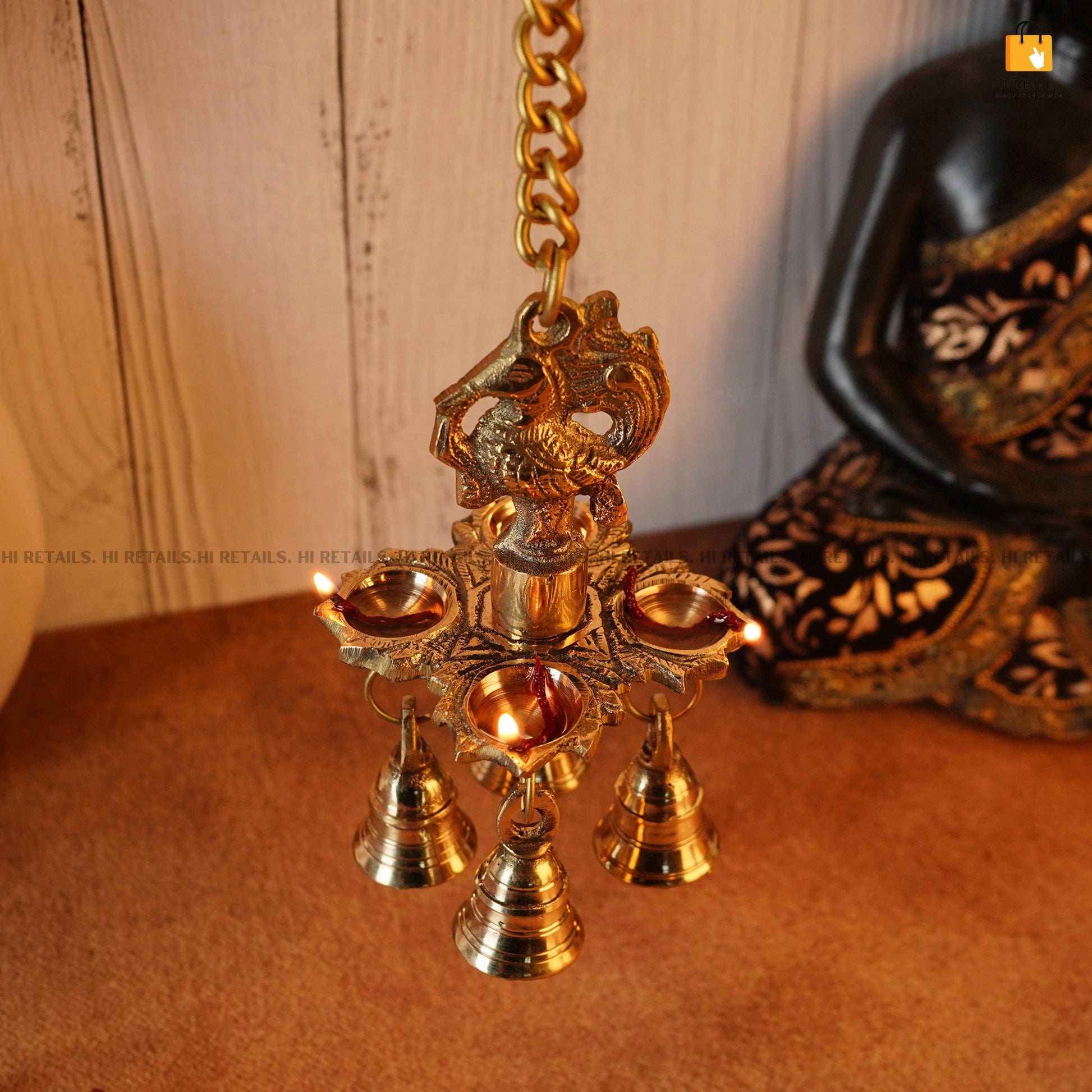 Elegant Brass Hanging Diya with Bells for Home and Temple Decor | Decorative Diya with Bells for Spiritual and Religious Use at www.hiretails.com