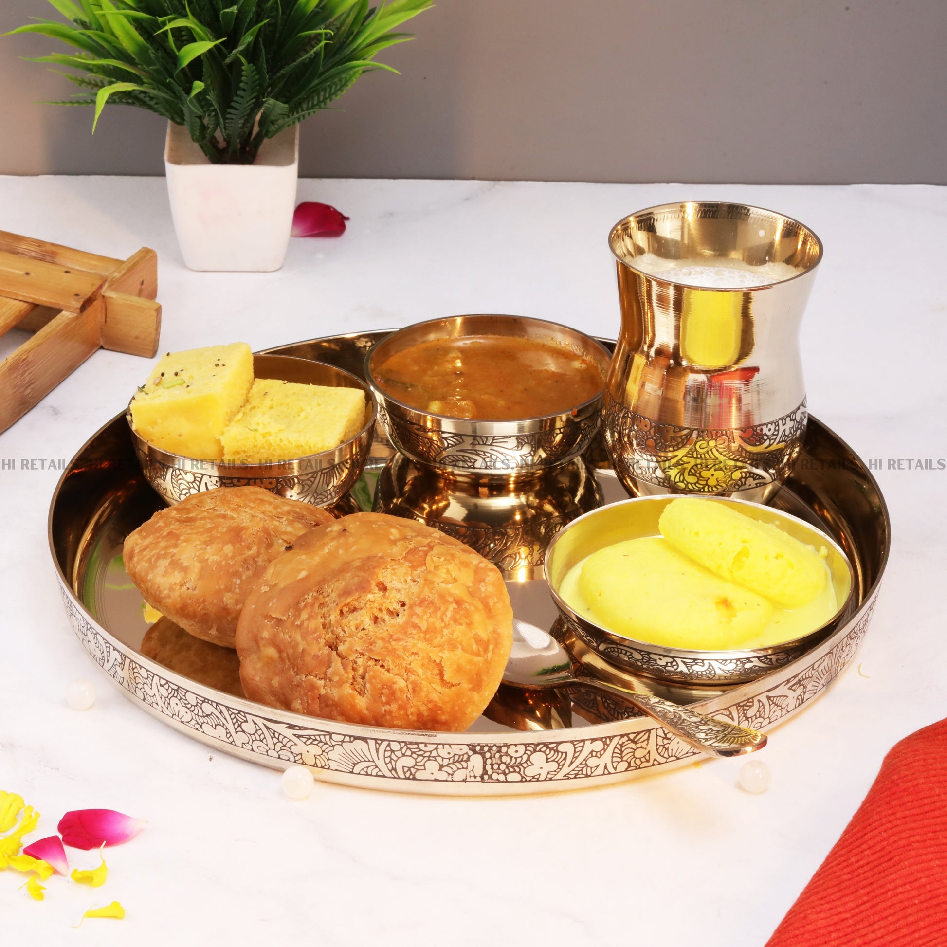 Elegant Kansa Thali Set - 6 Pieces, ideal for your pooja rituals, bringing a blend of tradition and luxury to your home. Available at www.hiretails.com.