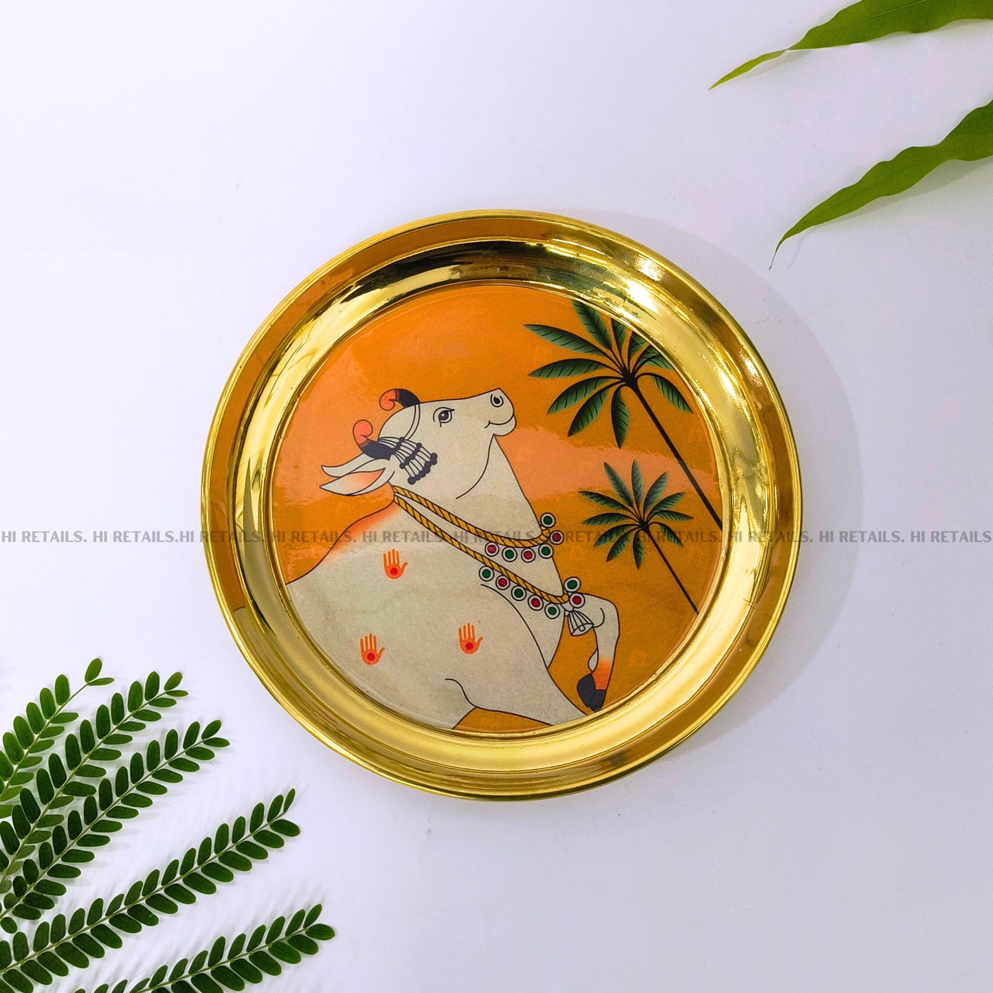 Brass Pichwai art cow printed plate, traditional design for pooja and home decor at www.hiretails.com