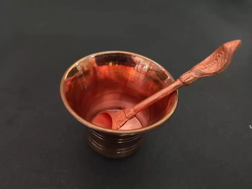 High-quality Pure Copper Tamba Pooja Panch Patra with Achmani and Spoon, ideal for worship rituals and home puja decor. Available at www.hiretails.com.
