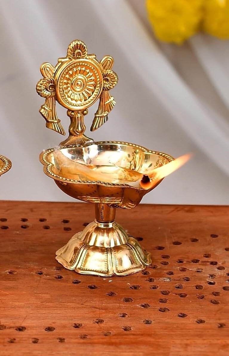 Traditional Pure Brass Chakra Kuber Diya, perfect for enhancing your Diwali and Puja celebrations with divine light. Available at www.hiretails.com.