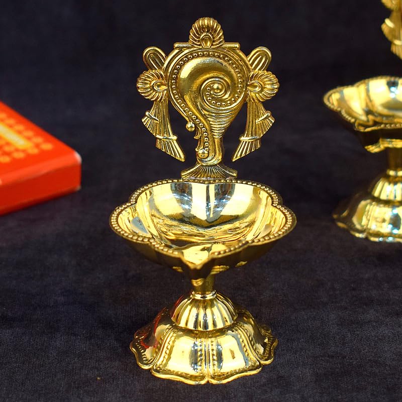 Brass hanging lamp with intricate design, perfect for home decor and spiritual settings. Available at www.hiretails.com.