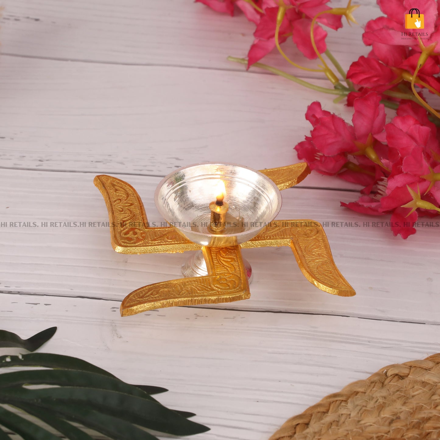 Decorative brass oil lamp with intricate design and box, perfect for home decoration and spiritual rituals. Available at www.hiretails.com.