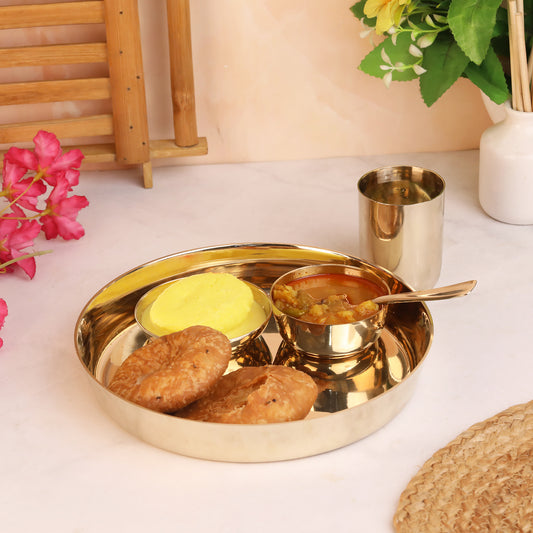 Elegant kansa thali dinnerware set with bowls and spoons for dining and home decor at www.hiretails.com