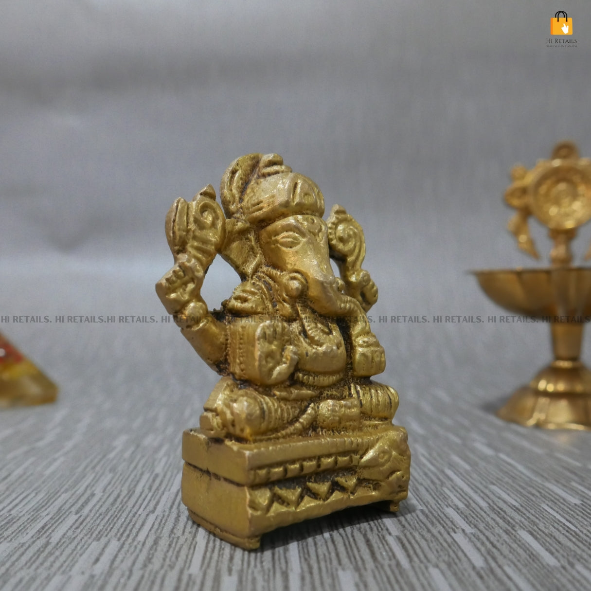brass Ganesh idol at www.hiretails.com