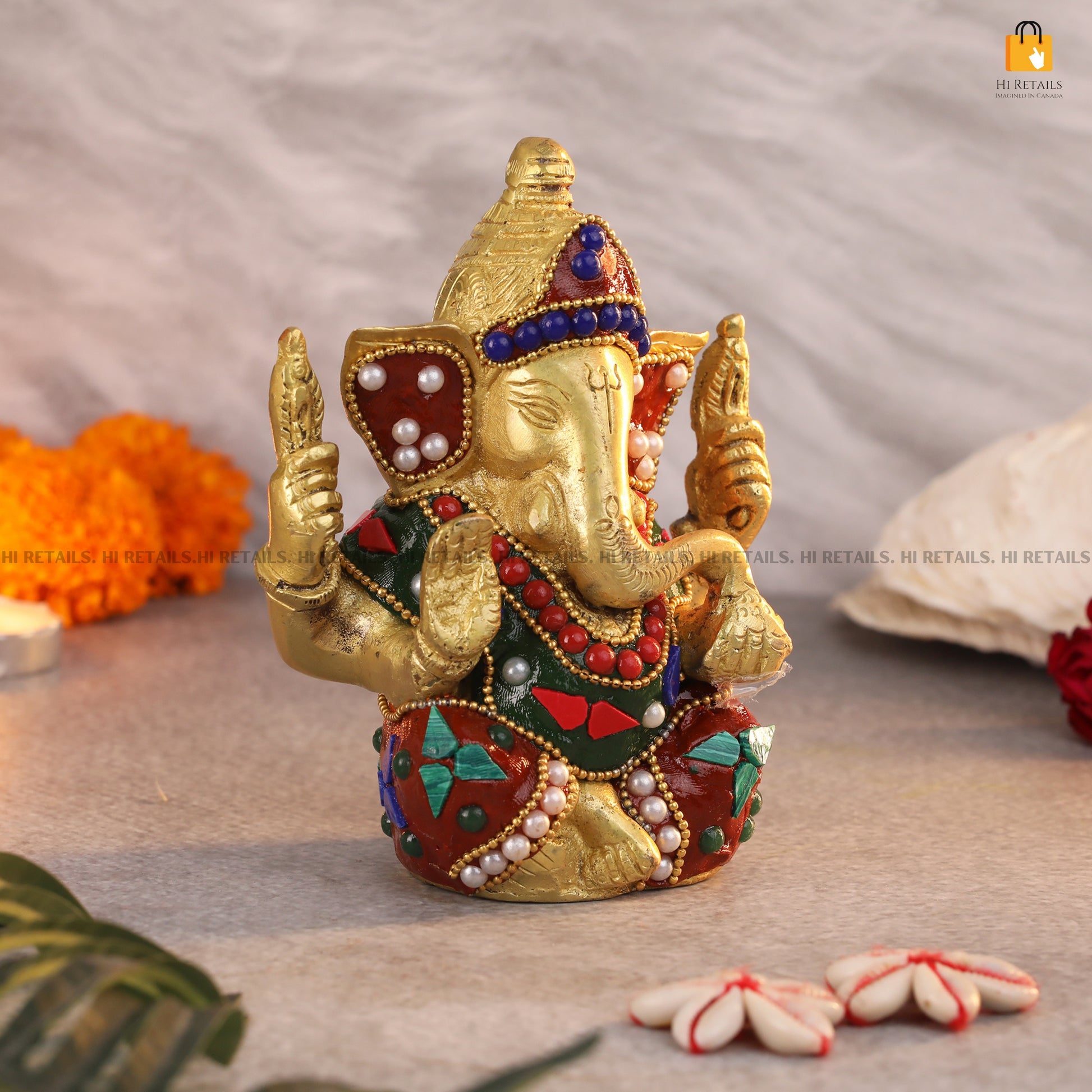 Elegant Brass Ganesha Statue with Decorative Stones for Religious Worship | Ideal for Ganesh Chaturthi and Home Decor at www.hiretails.com